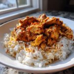 A close-up of Instant Pot Chicken Shawarma Rice served in a white bowl, featuring seasoned chicken over fluffy white rice.